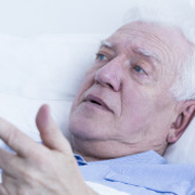 old man in hospital bed
